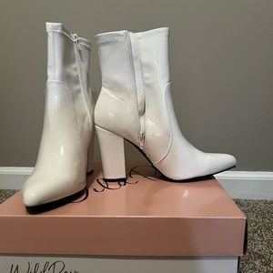 Wild pair white heel booties!